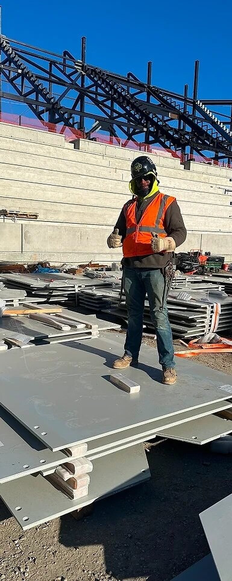 Steel roof trusses above stadium seating